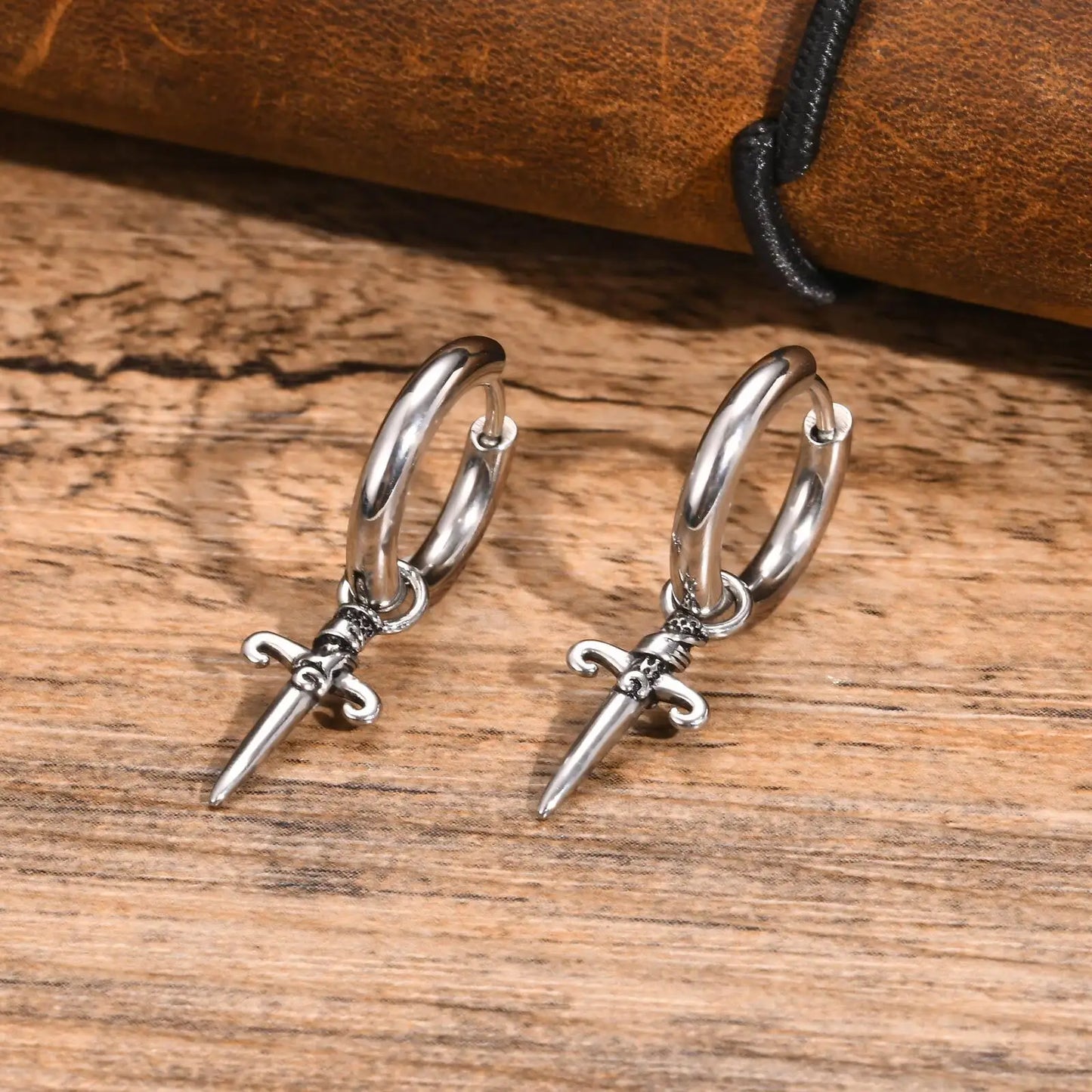 Boucle d'oreille croix homme