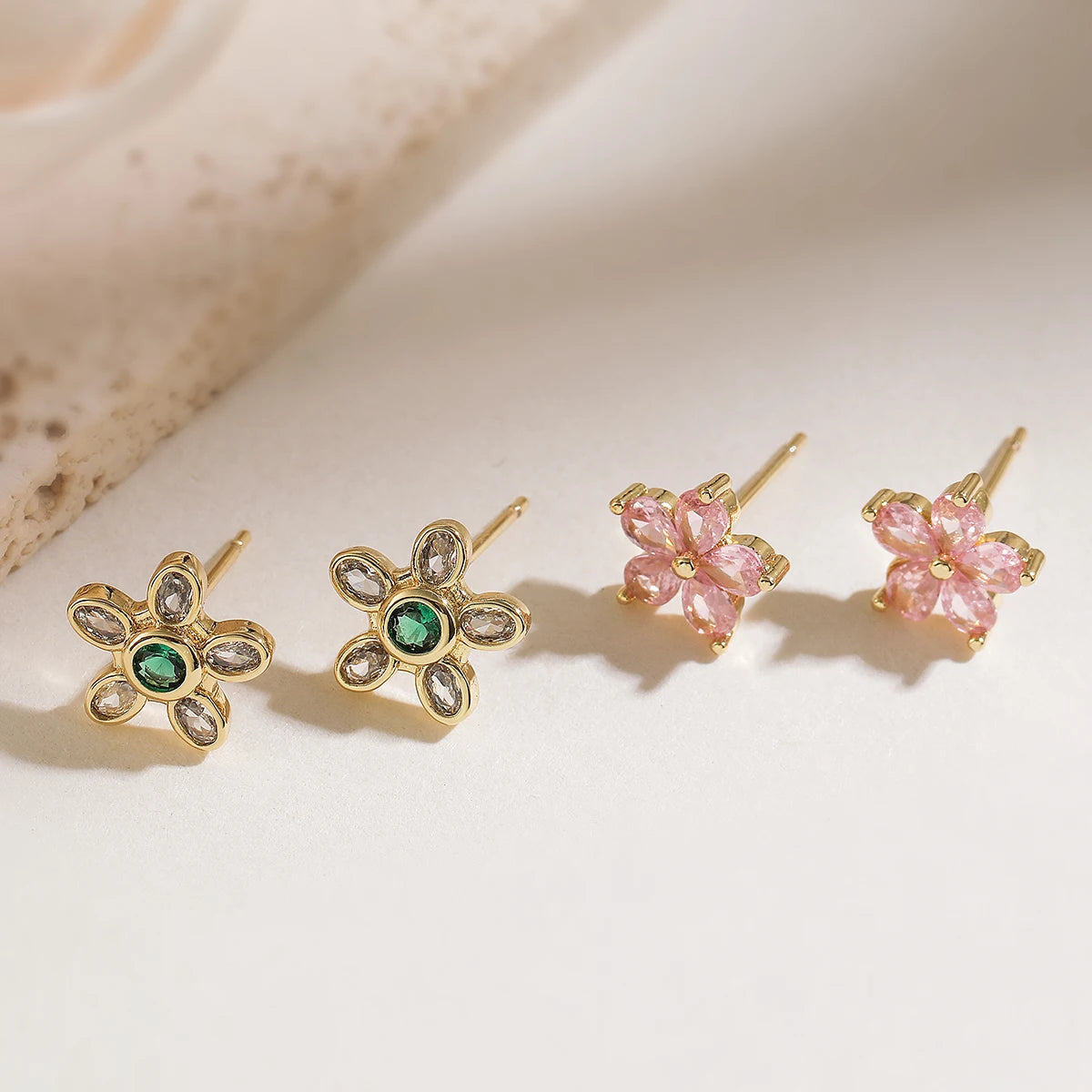Boucle d'oreille fleur rose