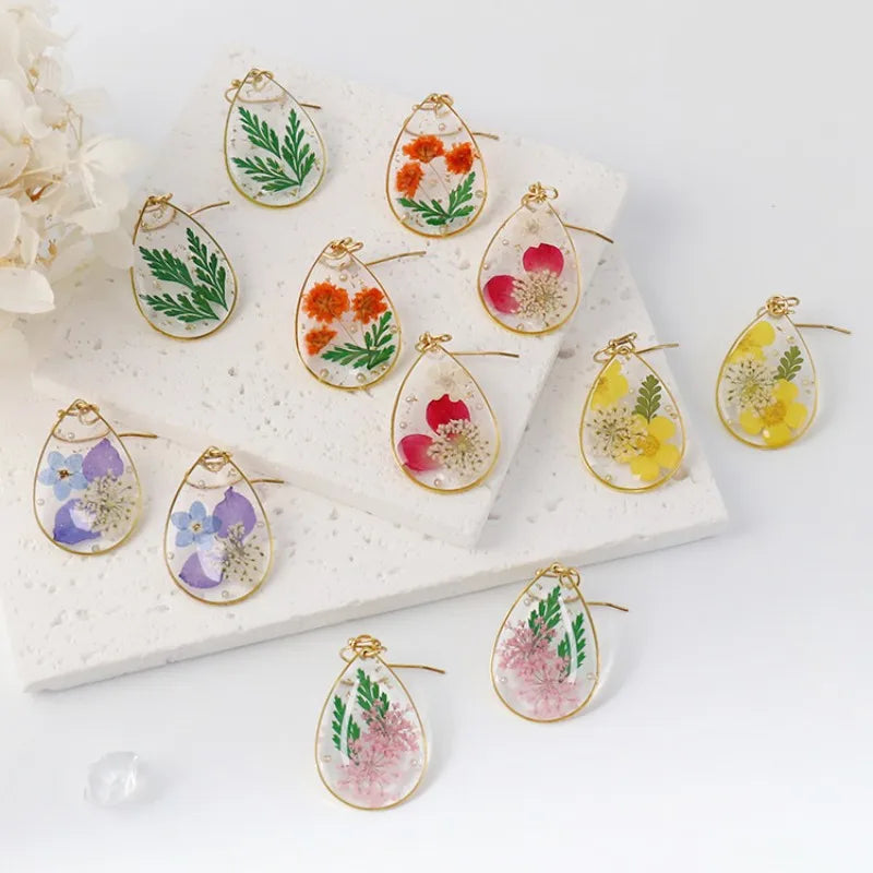 Boucles d'oreilles fleur resine
