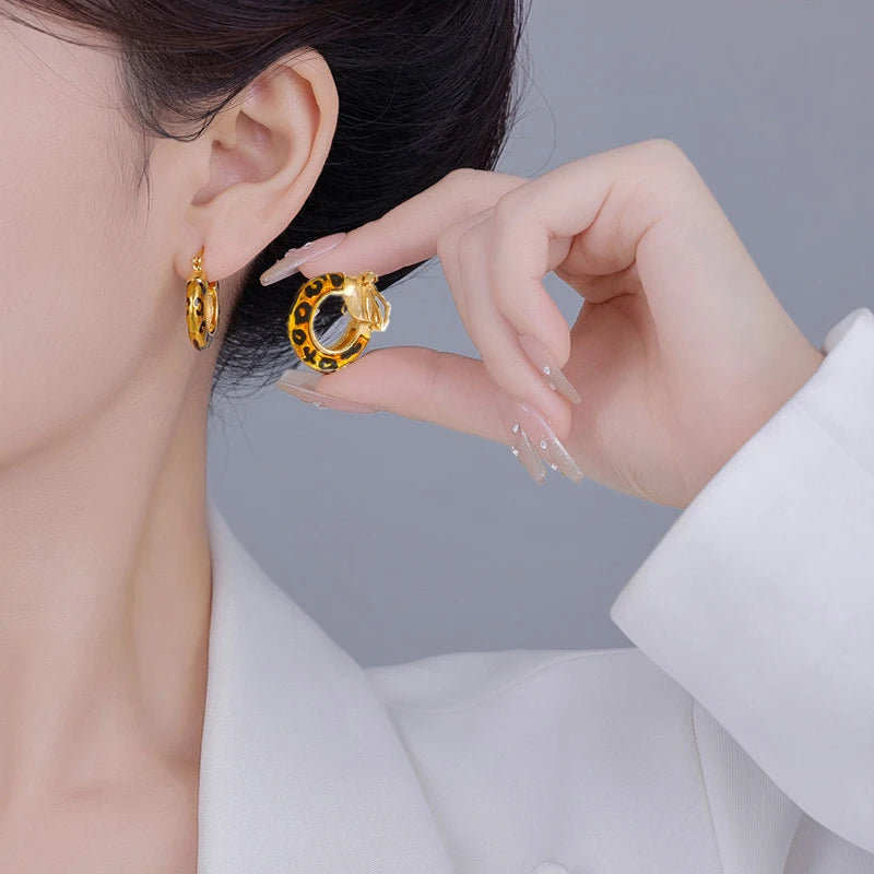 Boucle d'oreille leopard or