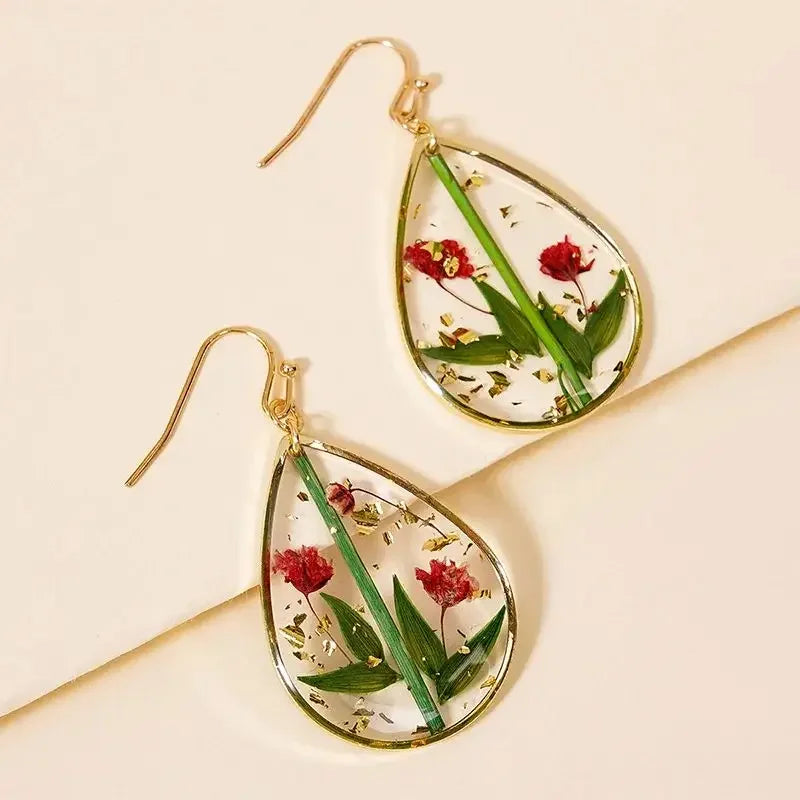 Boucles d'oreilles fleur resine