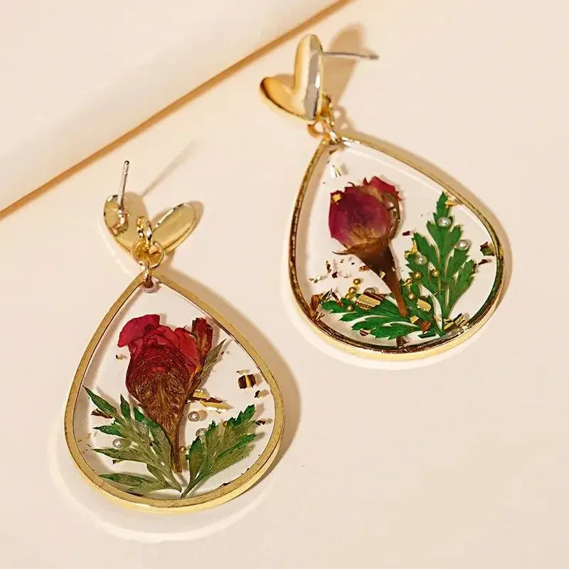 Boucles d'oreilles fleur resine