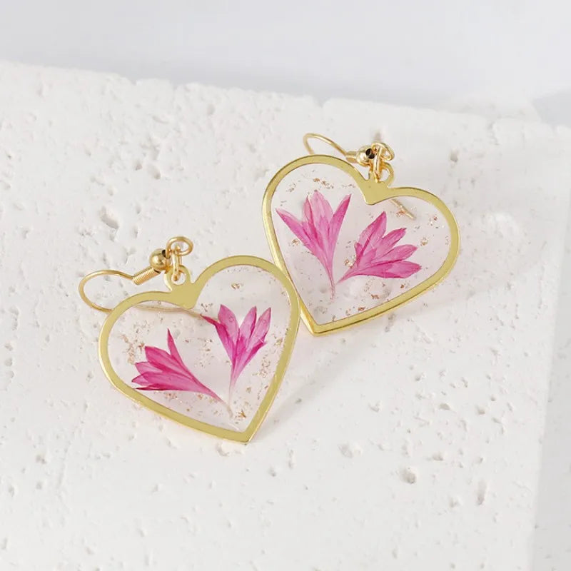 Boucles d'oreilles fleur resine