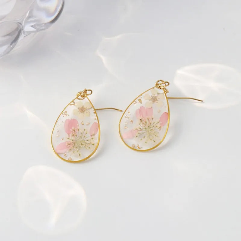 Boucles d'oreilles fleur resine