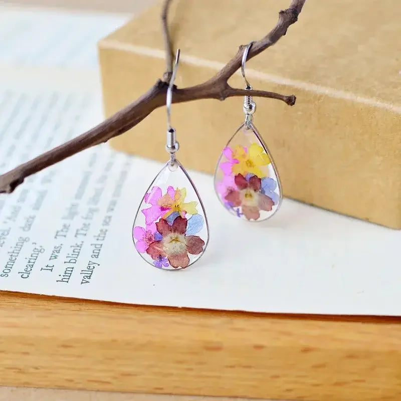 Boucles d'oreilles fleur resine