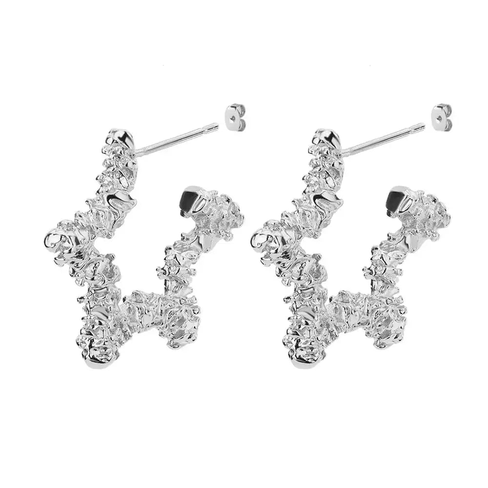 Boucle d'oreille etoile de mer