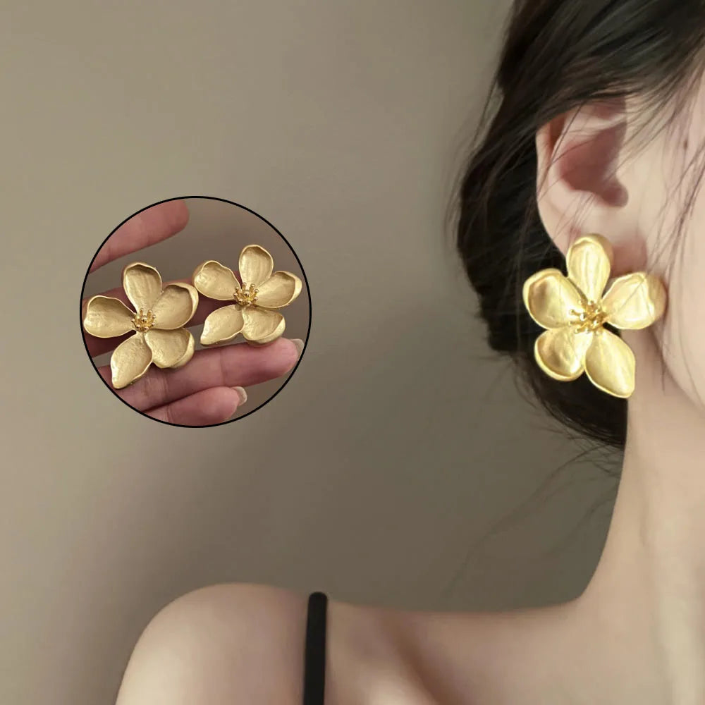 Boucle d'oreille fleur acier inoxydable