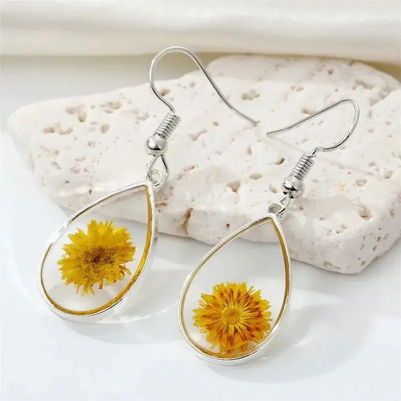 Boucles d'oreilles fleur resine