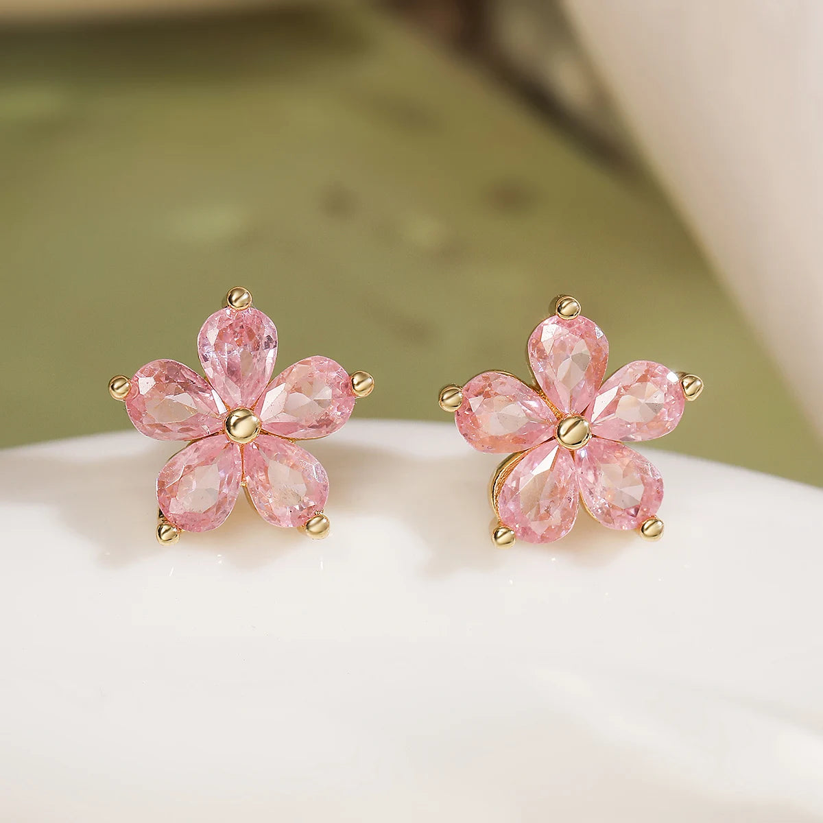 Boucle d'oreille fleur rose