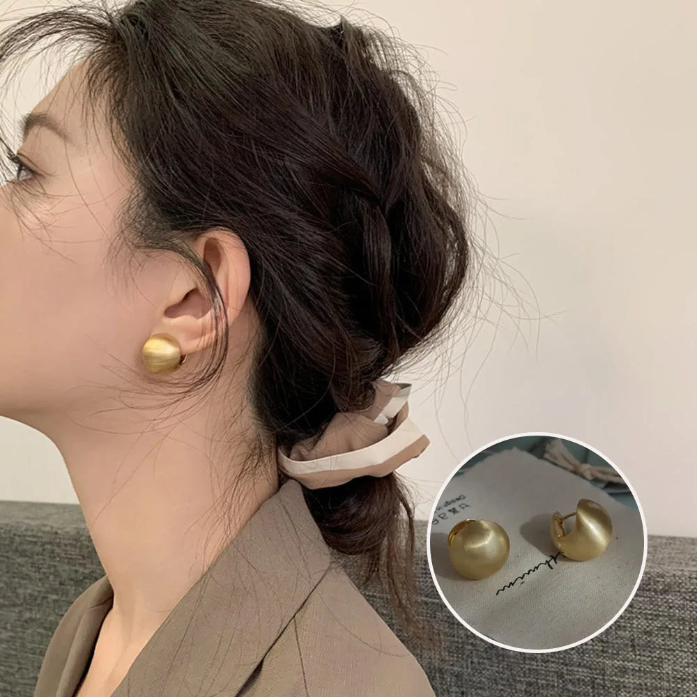 Boucle d'oreille fleur acier inoxydable
