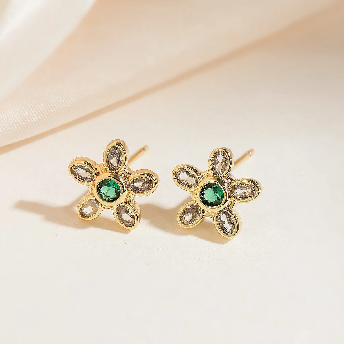 Boucle d'oreille fleur rose