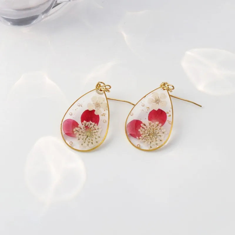 Boucles d'oreilles fleur resine