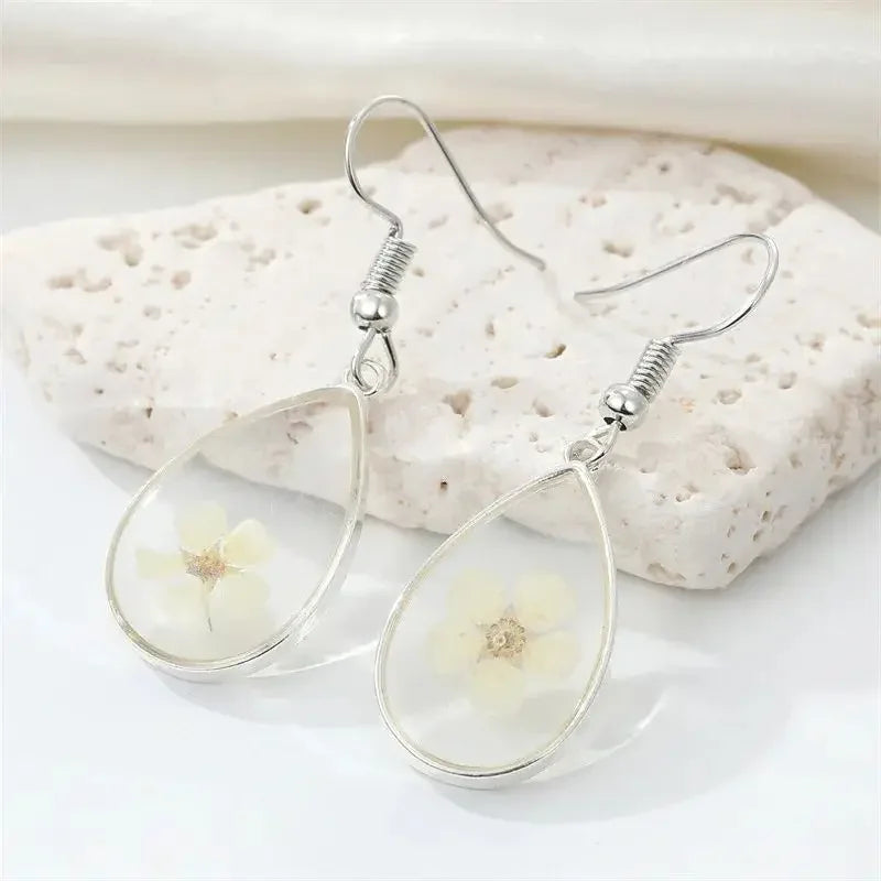 Boucles d'oreilles fleur resine