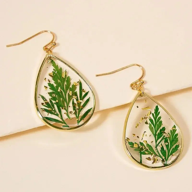 Boucles d'oreilles fleur resine