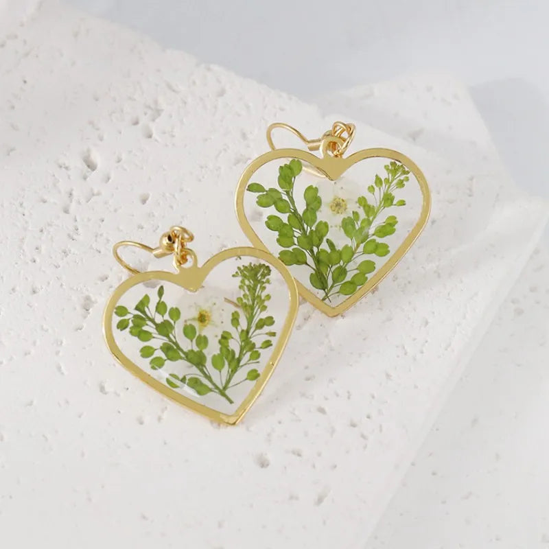 Boucles d'oreilles fleur resine