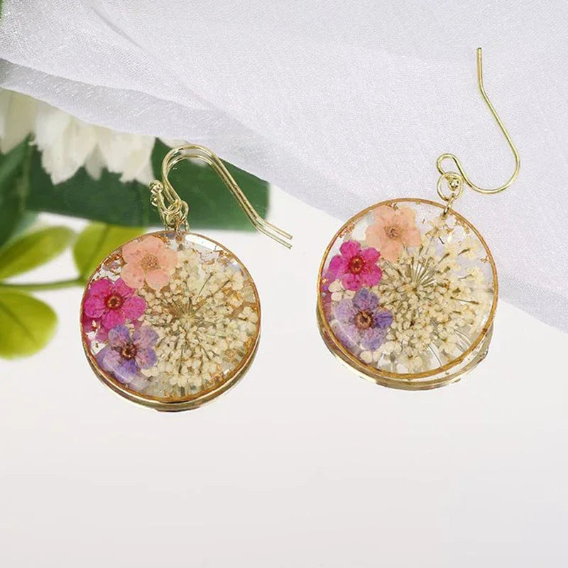 Boucles d'oreilles fleur resine